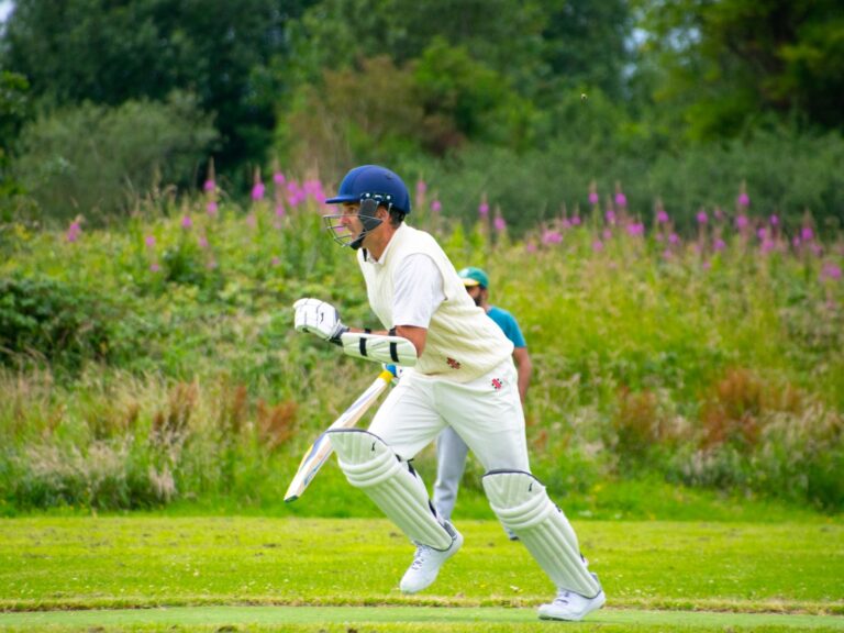 Members in traditional whites engaged in a friendly cricket match at Dundalk Cricket Clu
