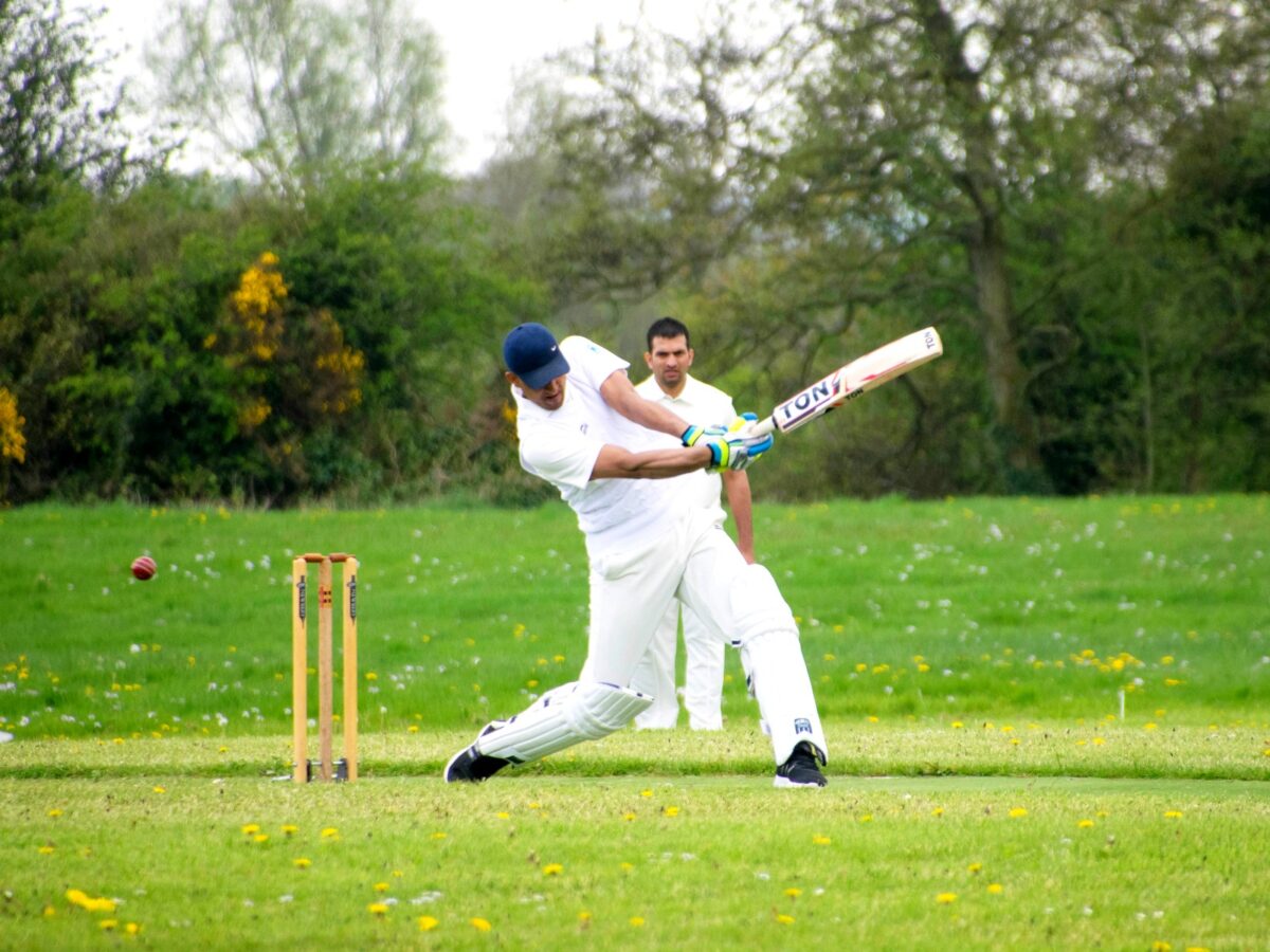 Members in traditional whites engaged in a friendly cricket match at Dundalk Cricket Clu