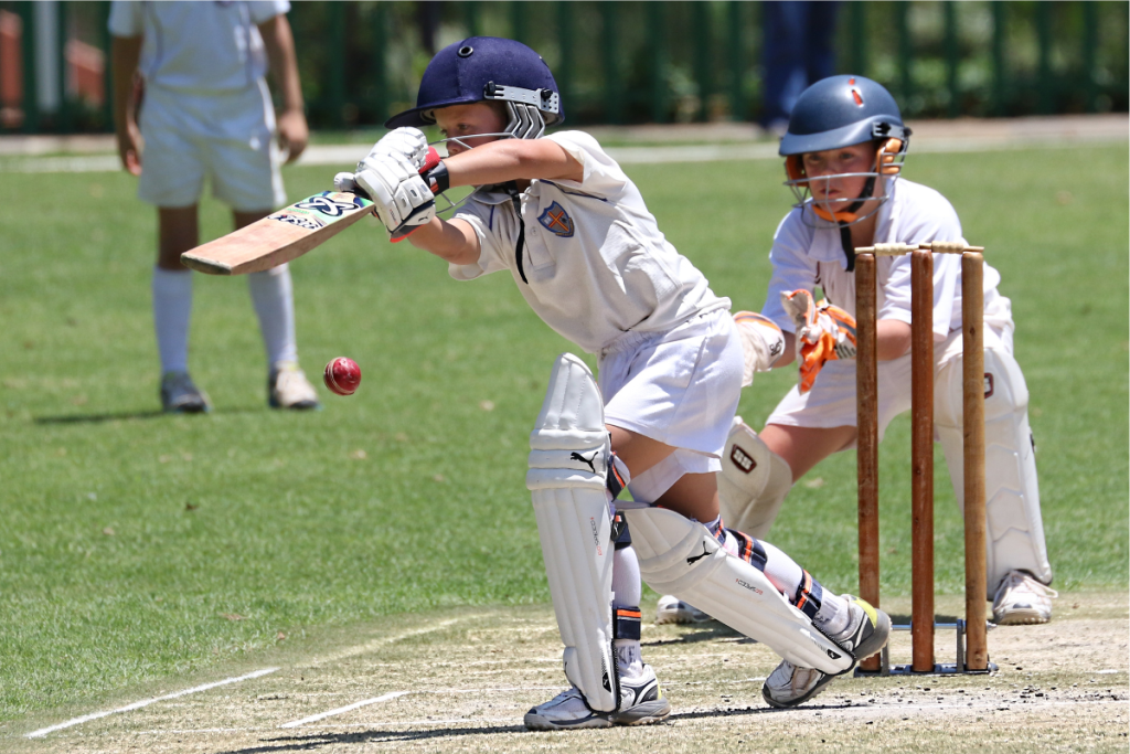 Members of Dundalk Cricket Club displaying excellent cricketing technique during a friendly game, enjoying the sport while competing